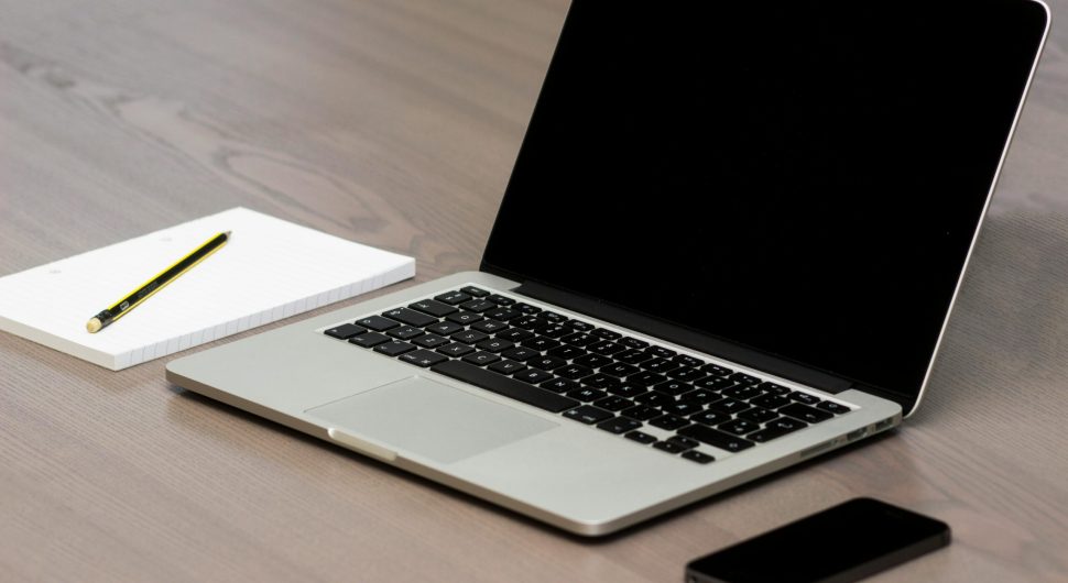 Free Silver Macbook Beside Iphone Stock Photo